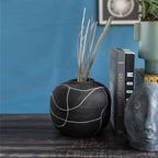 Creative Co-Op Round Decorative Stoneware Vase with Hand-Painted Intersecting Lines, Black and White