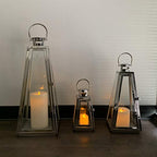 Allgala 3-PC Lantern Set 24 Inch Jumbo Deluxe Modern Indoor/Outdoor Candle Lantern Set Silver Chrome Stainless Steel Tapered Trapezoid Frame with Tempered Glass for Garden Patio Fireplace Wedding - color: Taper Silver