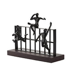 Deco 79 Black Metal Contemporary Sculpture, Climbing 10 x 14 x 9 - size: 14"L x 9"W x 10"H
