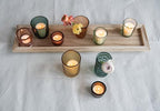 Creative Co-Op Round Glass Votive Holders on Wood Tray, Yellows & Greens, Set of 9 - color: Yellow/Green