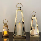 Allgala 3-PC Lantern Set 24 Inch Jumbo Deluxe Modern Indoor/Outdoor Candle Lantern Set Gold Stainless Steel Tapered Trapezoid Frame with Tempered Glass for Garden Patio Fireplace Wedding - color: Taper Gold