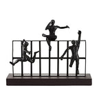 Deco 79 Black Metal Contemporary Sculpture, Climbing 10 x 14 x 9 - size: 14"L x 9"W x 10"H