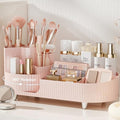 Pink Rotating Vanity Organizer with Brush Holder - Large Spinning Cosmetic Storage, Countertop Makeup & Skincare Organizer, Perfume & Lotions Display Case - color: Pink