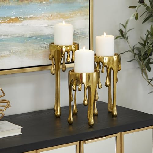 CosmoLiving by Cosmopolitan Aluminum Metal Abstract Decorative Candle Holder Melting Drip Candle Stand, Set of 3 Candlestick Holder 12", 10", 8"H, Gold - color: Gold