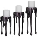 CosmoLiving by Cosmopolitan Aluminum Metal Decorative Candle Holder Pillar Candle Stand with Dripping Melting Designed Legs, Set of 3 Candlestick Holder 12", 10", 8"H, Black - color: Black
