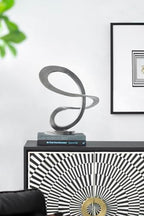 14.5” x 16.5” Black Metal Curved Abstract Art Sculpture with Round Base, Modern Art Deco Home Accent Sculpture, Centerpiece for Tabletop, Mantel, Bookshelf, Countertop, Office, Living Room