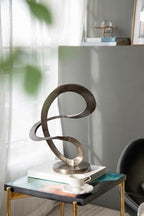 14.5” x 16.5” Black Metal Curved Abstract Art Sculpture with Round Base, Modern Art Deco Home Accent Sculpture, Centerpiece for Tabletop, Mantel, Bookshelf, Countertop, Office, Living Room