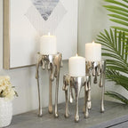 CosmoLiving by Cosmopolitan Aluminum Metal Abstract Decorative Candle Holder Melting Drip Candle Stand, Set of 3 Candlestick Holder 12", 10", 8"H, Silver - color: Silver