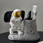 BUTILIVEEN Astronaut Pen Pencil Holder with Phone Stand, Resin Spaceman Pen Container Cell Phone Stand for home Office Desktop Decoration, Gifts for Space Lovers, Gifts for Christmas - style: Phone Pen Holder