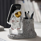 BUTILIVEEN Astronaut Pen Pencil Holder with Phone Stand, Resin Spaceman Pen Container Cell Phone Stand for home Office Desktop Decoration, Gifts for Space Lovers, Gifts for Christmas - style: Phone Pen Holder