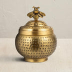 Creative Co-Op Round Hammered Metal Container with Bee Finial, Brass Finish - style: Bee