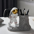 BUTILIVEEN Astronaut Pen Pencil Holder with Phone Stand, Resin Spaceman Pen Container Cell Phone Stand for home Office Desktop Decoration, Gifts for Space Lovers, Gifts for Christmas - style: Phone Pen Holder